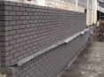 Brick clad skin to commercial building