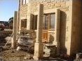 Construction of the stone portico pillars