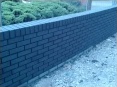 Radius wall with raked out joints