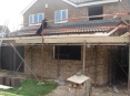 Two storey side extension including garage, combined with single storey rear kitchen extension