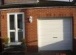 Feature "soldier" bricks above garage door and block paved driveway