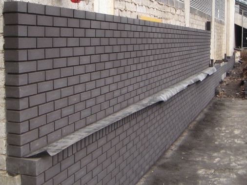 Brick clad skin to commercial building