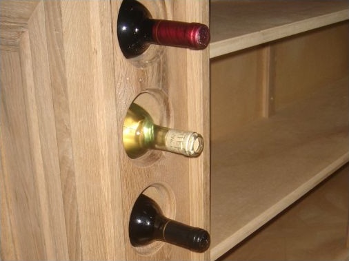 Sections in bar construction "Routed Out" in order to house wine bottles