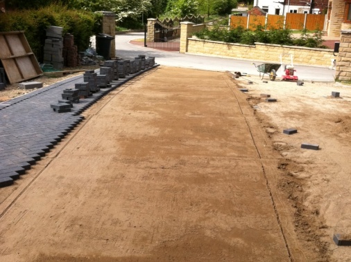 Screed sand compressed and levelled ready for block paving to be laid