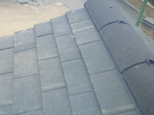 Dry ridge pack used to roof of portico